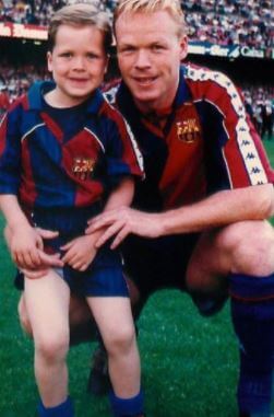 Little Tim Koeman with his father Ronald Koeman.